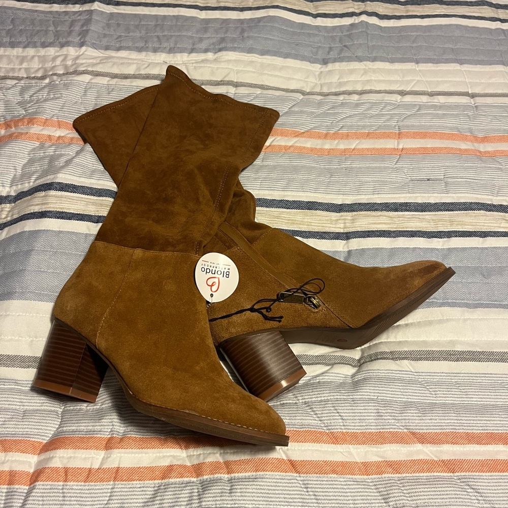 Brand new boots…Side zipper and cute heel!